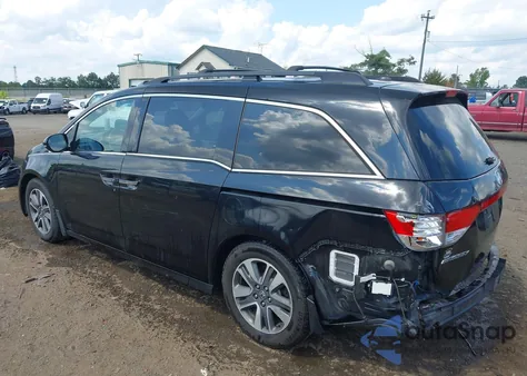 2016 Honda Odyssey Touring/Touring Elite z USA, uszkodzony, nr VIN 5FNRL5H9XGB054870